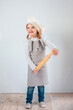 © Yulia - Little girl cook with rolling pin
