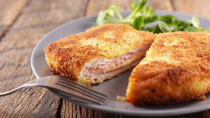 Wall Mural - Cordon bleu on plate with lettuce