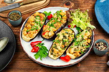 Wall Mural - Halved baked eggplant stuffed meat.