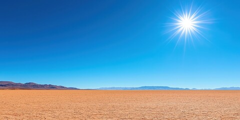 vast desert landscape under a bright sun with clear blue sky