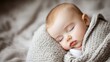 © FoxGrafy - Peaceful sleeping baby wrapped in soft blanket