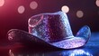 © Boraryn - A glittery cowboy hat resting on a surface, illuminated by colorful lights.