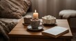 © Sergey - Cozy evening with hot chocolate book candlelight