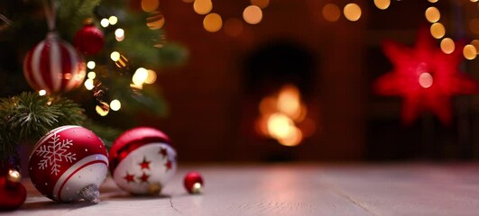 Wall Mural - christmas tree with toys close-up on the background of the fireplace. home holiday background