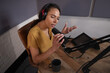 © ReeldealHD images - Podcaster smiling in a professional recording studio about to record