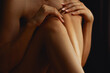© Mirrorstudio - Tanned women's shinss closeup. Skin and body care