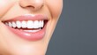 © pvl0707 - Happy woman enjoying a bright smile while brushing her teeth in a studio setting against a dark background