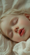 © Daria94 - Close-up portrait of a young child peacefully sleeping, showcasing soft features and gentle lighting for a calm, serene atmosphere.