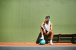 © peopleimages.com - Male person, wall background and ball as athlete or basketball player for game, skills and training. Man, mockup space and coaching advice for advertising, wellness or challenge in exercise or sports