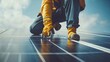 © Penatic Studio - Worker Installing Solar Panel with Metal Clamp