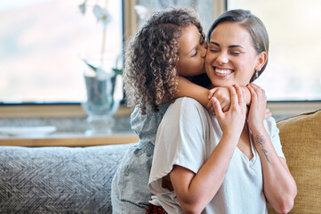 Wall Mural - Hug, kiss and mom on sofa with child for morning bonding, gratitude and support in fun family home. Love, mother and daughter on couch with happy embrace, care and connection in living room together.