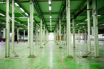 The abandoned industrial structure stands as a relic of the past, its steel frame and glass windows reflecting the city's urban transformation