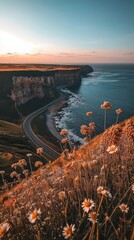 Wall Mural - A scenic coastal road winding along steep cliffs, with the vast ocean stretching out below.