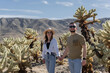 © Julija - Couple in Joshua tree National Park, Cholla cactus garden. USA, California. Focus on woman