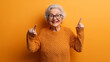 © mizan - Photo of satisfied optimistic pretty glad grandma pointing at herself boasting about handmade knitted seasonal jumper isolated bright color background