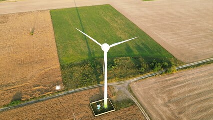 Wall Mural - Drone shot of wind turbines in a rural landscape