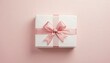 © Anarkali Art - White Gift Box With Pink Satin Ribbon On Soft Pink Background