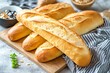 © thoriq - Freshly Baked Baguettes: A Close-Up Look at Golden Brown Crust and Soft Interior