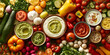 © wolfhound911 - A colorful flat lay of various dips and spreads, including hummus, guacamole, and tzatziki, surrounded by fresh vegetables