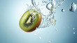 © Magic Kiddo - Sliced kiwi fruit splashing in water with backlight and bokeh effect