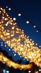 Wall Mural - golden bokeh lights overlay, abstract blurred background of festive string lights decoration