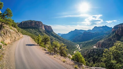 Sticker - Mountain road on a sunny day, surrounded by breathtaking scenery. This stunning mountain road invites adventure, perfect for travel or outdoor-themed designs with ample copy space.