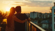 © Mirjana - Couple enjoying a beautiful sunset view from their balcony in a vibrant city as the sky changes colors at dusk