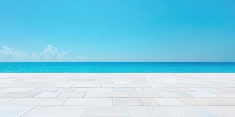 Wall Mural - Serene ocean view with a clear blue sky and white stone patio.