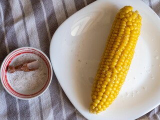 Freshly cooked corn on the cob with butter