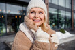 © deagreez - Photo of dreamy adorable lady dressed beige coat walking shopping feeling cold outdoors residential complex