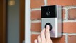 © ahmed elmaslamani - Smart Doorbell with Camera on Brick Wall