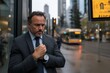 © Milos - A reflective gentleman stands beside a bustling bus lane in the city, clad in formal attire, pondering amidst the evening commute's transient atmosphere.