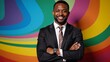 © Pixel Matrix - African American Gay Man Standing Tall Against Rainbow Backdrop Emblem of Love Inclusion  Equality