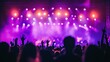 © WITTAYA  ANGMUJCHA - Purple Concert Vibe - Bold purple lights illuminating the concert scene, creating an engaging and colorful vibe.