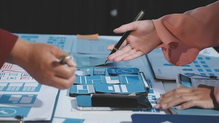 The designer team is designing the uxui system to make the uxui system work well on new phones and support system updates. Website development concept UI UX front end designer