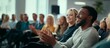 © Evodigger - Applauding people. Happy satisfied audience joyfully applauding during business conference or seminar.