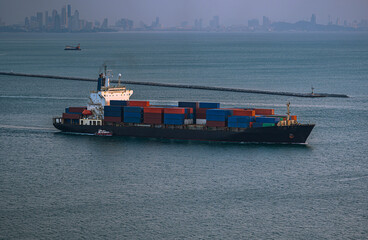 Large container ship at sea. Aerial view of cargo container ship vessel import export container sailing. Large ship sails in the middle of the sea.