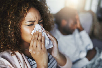 Wall Mural - sick woman, sneeze and blowing nose with tissue on sofa for allergy, virus or flu and cold together 