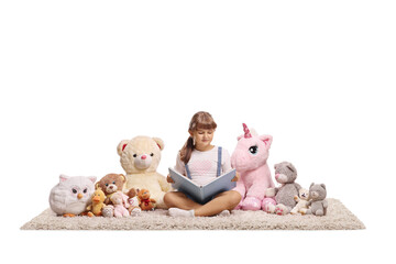 Poster - Little girl sitting on a carpet and reading a story to her plush toys