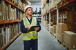 © Serhii - Portrait of warehouseman with clipboard checking delivery, stock in warehouse. Warehouse worker preparing products for shipment