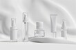© kavinda - Elegant White Skincare Packaging Collection with Glass Bottles, Jars, and Tubes for Luxury Beauty and Facial Skincare Product Photography