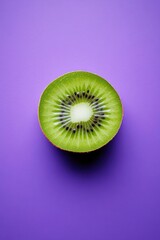 Poster - Cut kiwi fruit on purple surface