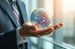 © Stock Planet - businessman hand holding a digital world at the palm of his hand, technology and innovation concept