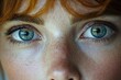 © Milaballe - Close-up of freckled face highlighting mesmerizing blue eyes and natural beauty