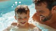 © Lens Legacy - A joyful moment of a father and his young son bonding in a swimming pool, capturing the essence of fun, happiness, and togetherness in a bright daylight setting.