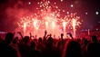 © Elena - New Year fireworks with crowd silhouettes, colorful explosions lighting up the sky above celebrating people, lively and communal atmosphere