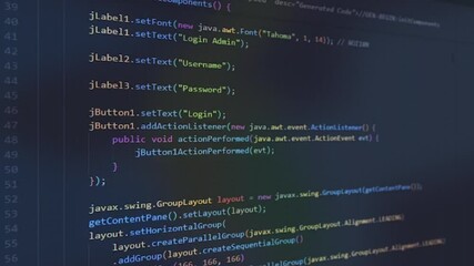 Programming code animation, lines of programming code on computer screen with close up shot.
