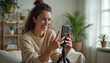 © Shubby Studio - Young influencer engages joyfully with audience through interactive mobile content