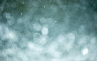 Wall Mural - the image is a blurry background of a blue sky with many small circles