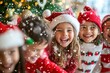 © Larisa - Joyful children in Santa hats enjoying snowfall